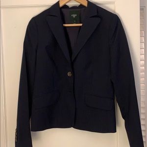 Navy pinstriped suit jacket